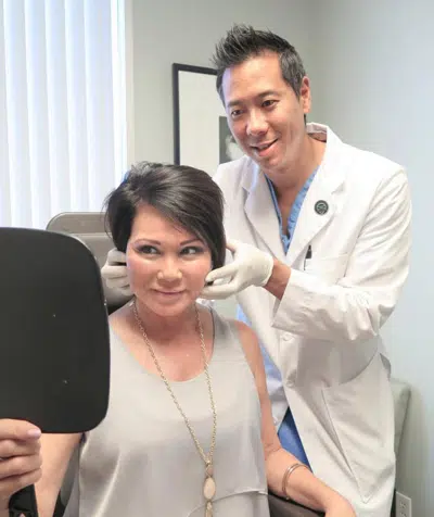 Lee with a happy patient
