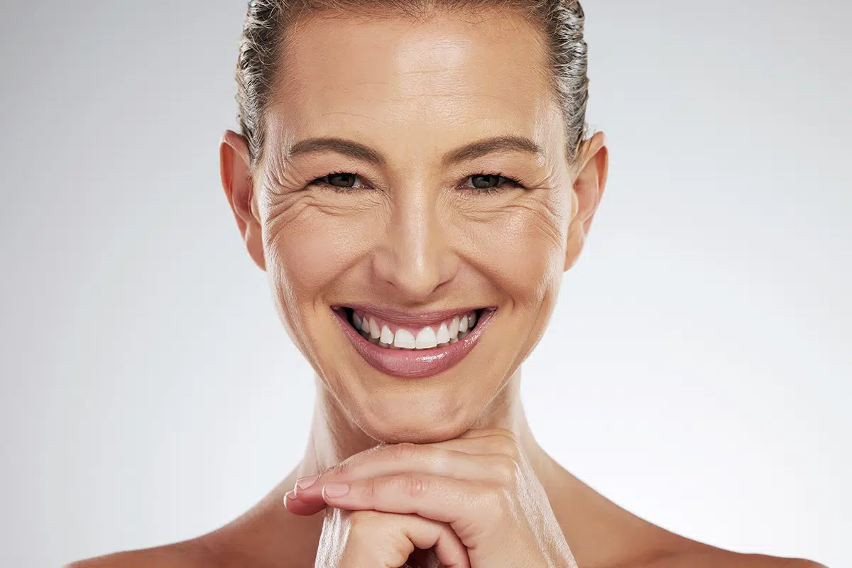 anti aging and beautiful mature woman with a smile on her face