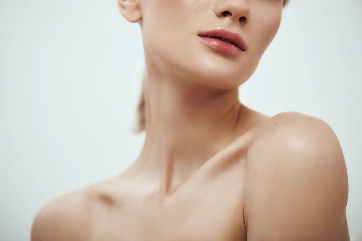 attractive young woman with naked shoulder
