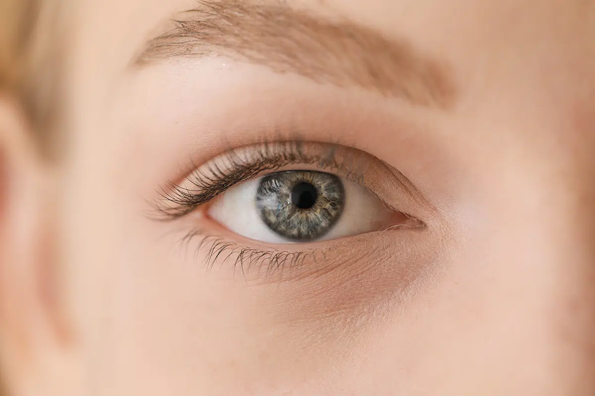 beautiful young woman after eyelashes lamination and dyeing
