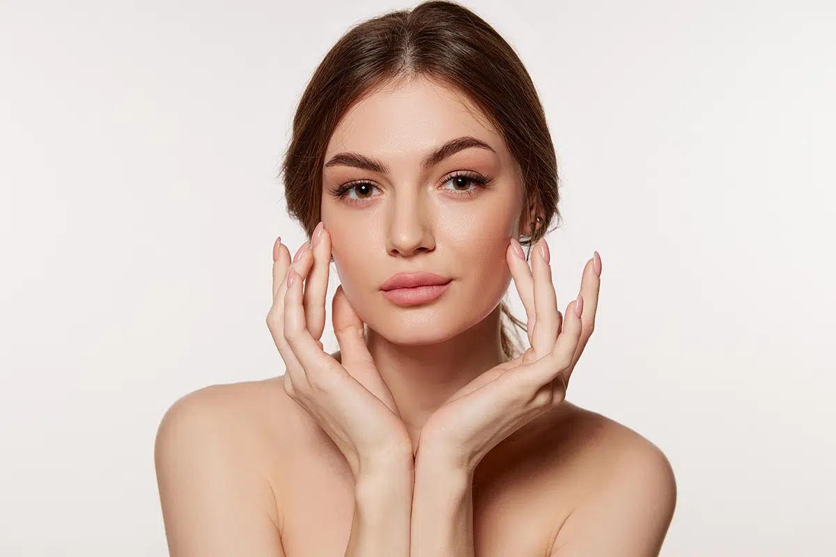 portrait of young beautiful woman with perfect smooth skin