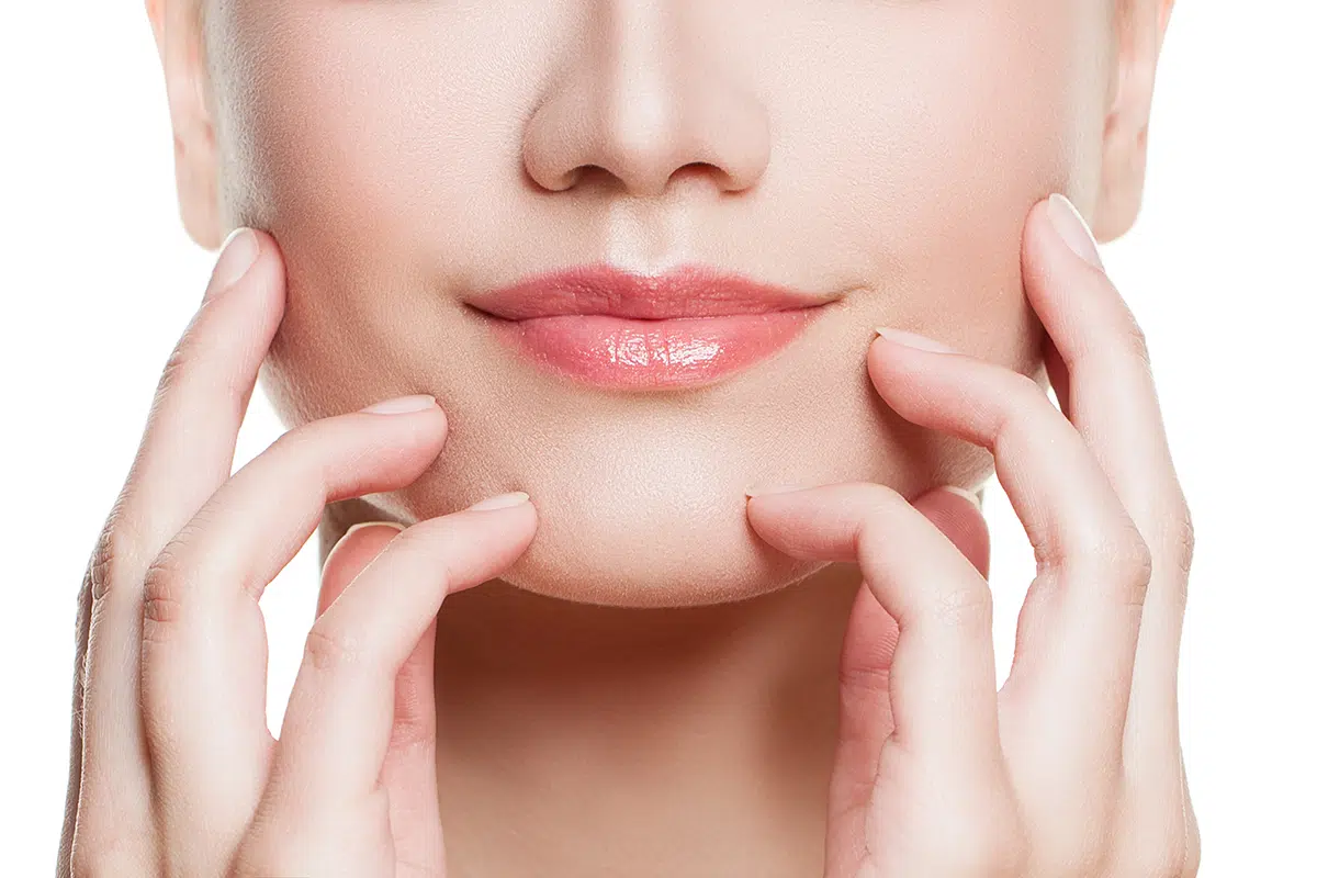 woman lips and hands with natural nails